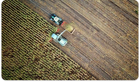 Tractor farming aerial view